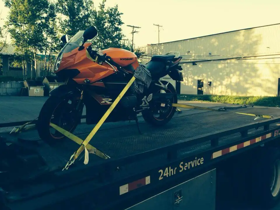 Why Motorcycle Towing Service in Ottawa Needs a Flatbed, Not a Hook