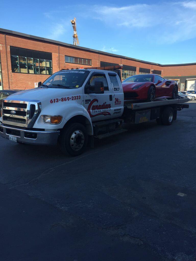 flatbed car being towed in Ottawa